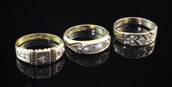 Three late 19th/early 20th century gold, seed pearl and diamond set dress rings, Sizes L,M&P.